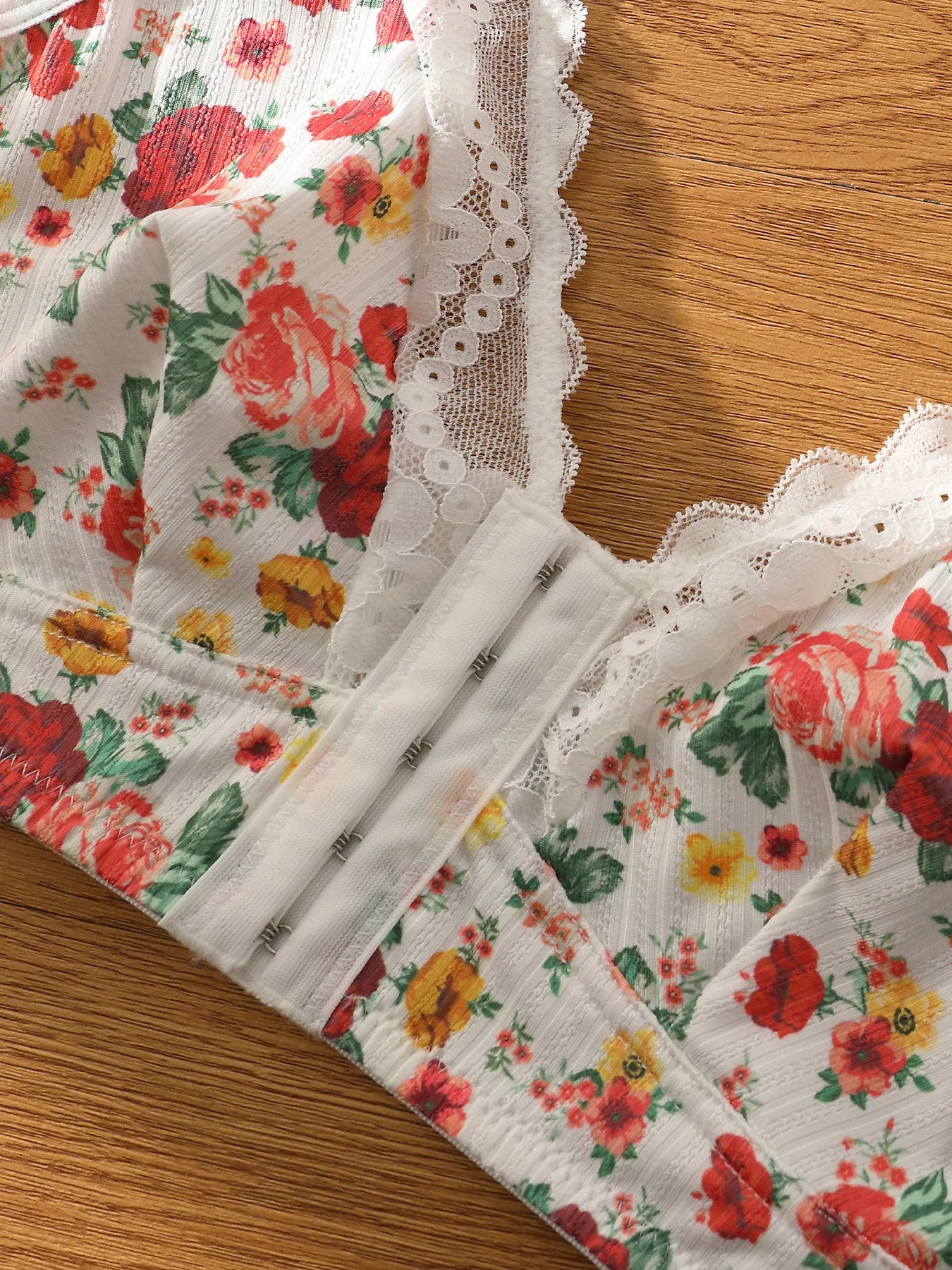 Three piece romantic and elegant floral printed lace bra with five rows of front buttons and adjustable shoulder straps