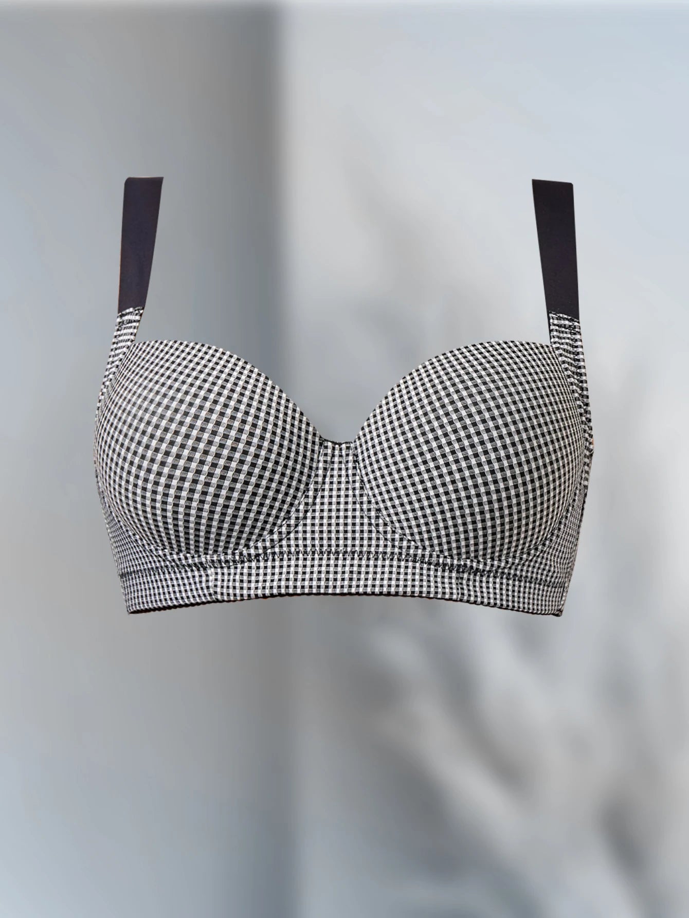 Grid-patterned Bra with uplifting support to prevent sagging, adjustable for a custom fit, comfortable against the skin,