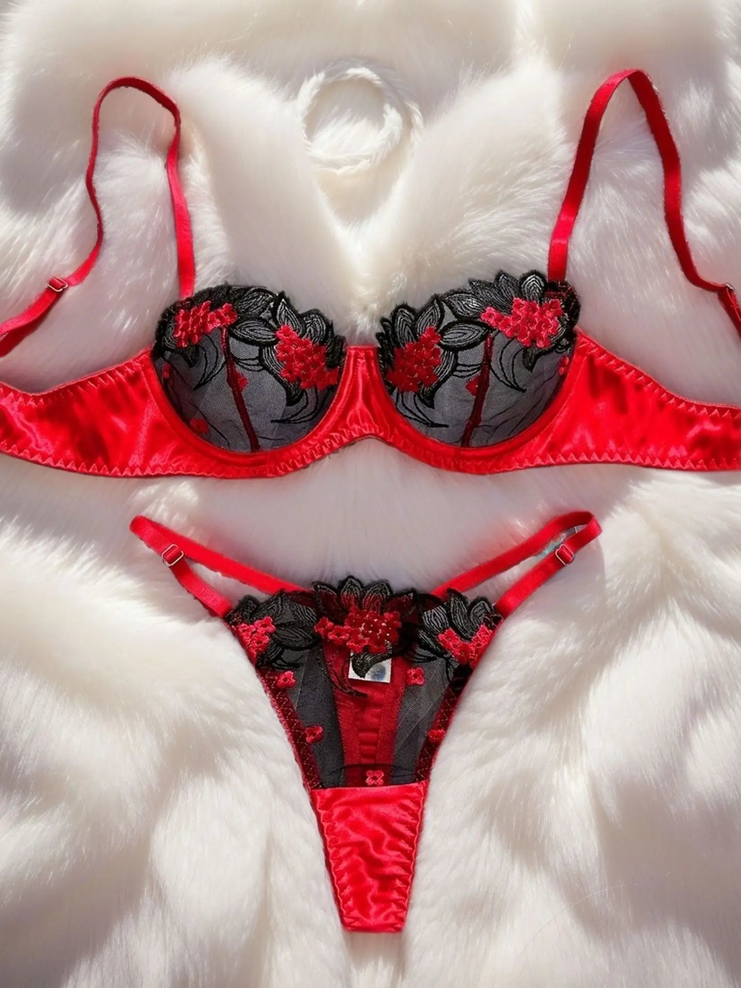 A set of sexy rose-red lingerie, including a bra and panties with daisy patterns, as well as a comfortable home-style