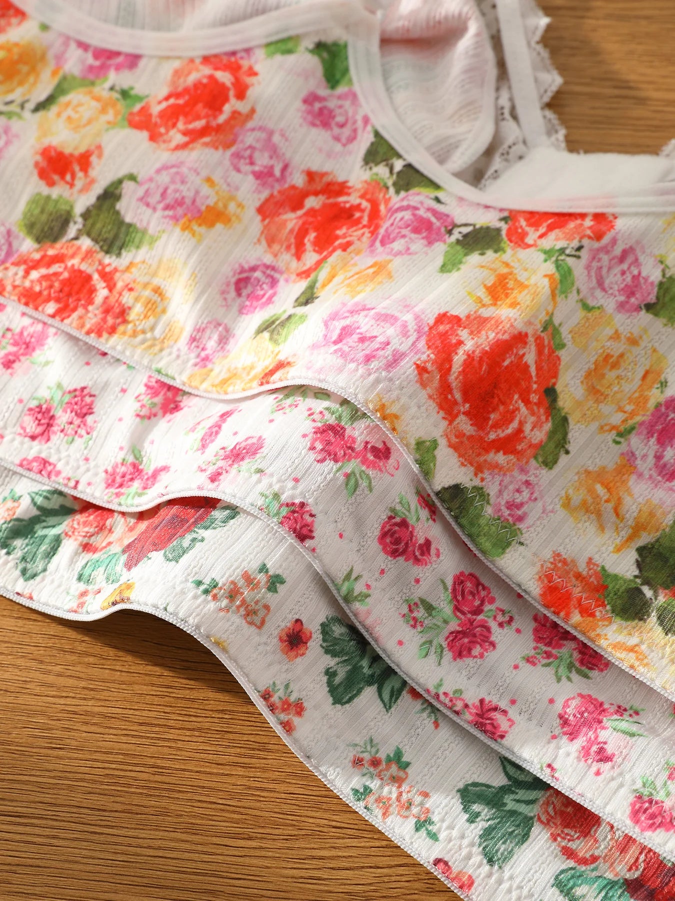 Three piece romantic and elegant floral printed lace bra with five rows of front buttons and adjustable shoulder straps