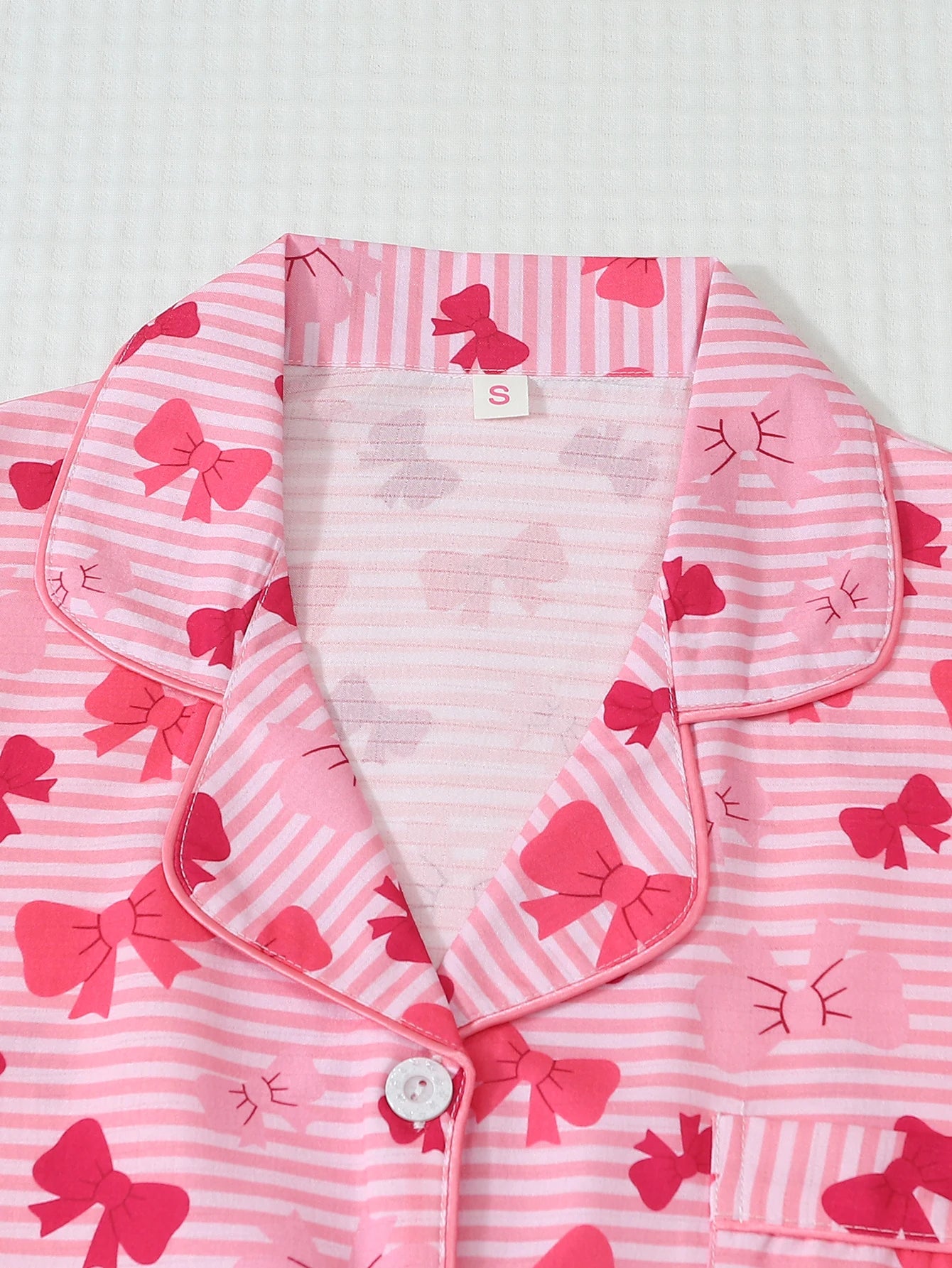Two-Piece Set: Comfortable Pink and White Striped Top with Red Bow Print, Turn-Down Collar, Buttoned Short Sleeves, and Pockets, Paired with Bow Shorts. Spring/Summer Women's Pajama Loungewear Set Suitable for Home Use
